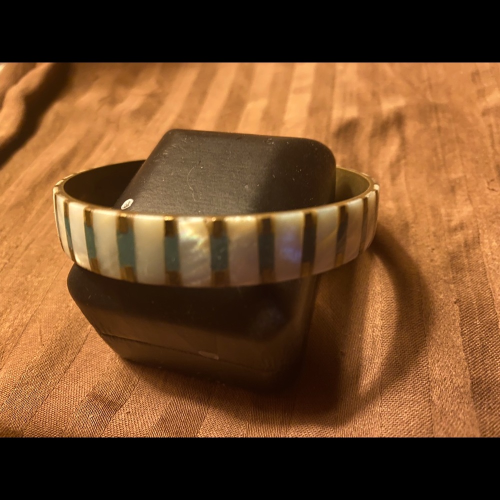Very nice inlay of pearl and turquoise in a bangle